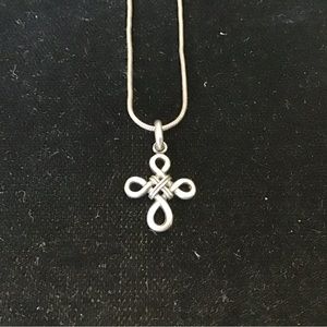Sterling silver chain and cross, both are marked 925.
